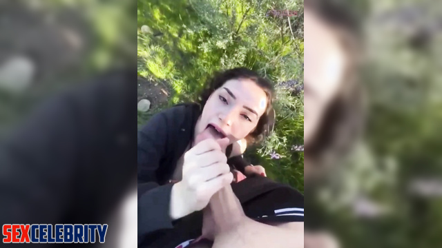 Hot Latina AI Michelle Galvan giving a blowjob in the park