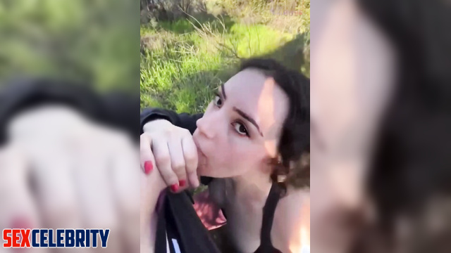 Hot Latina AI Michelle Galvan giving a blowjob in the park